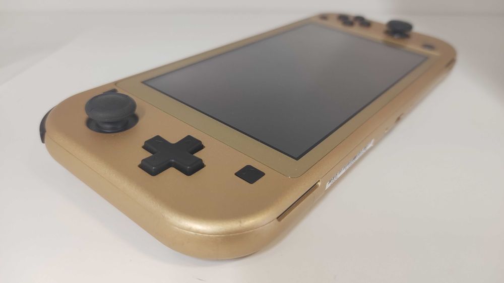 (BP) Nintendo Switch Lite Hyrule złota + Super Mario Bros + FC 25