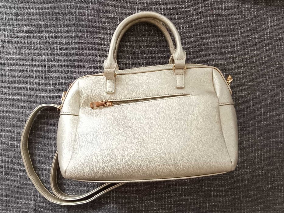 Mala de senhora dourada