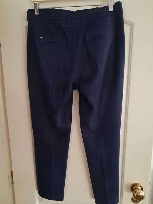 Calças pele pêssego azul quase novas