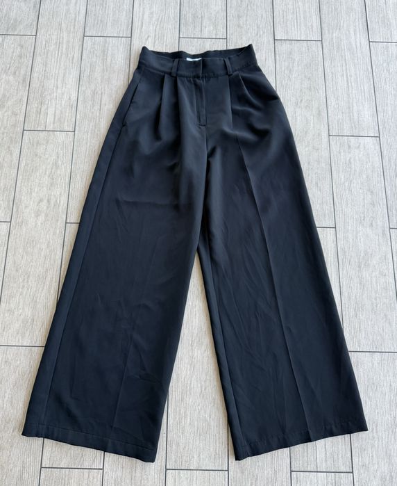 Брюки палаццо в чорному кольорі