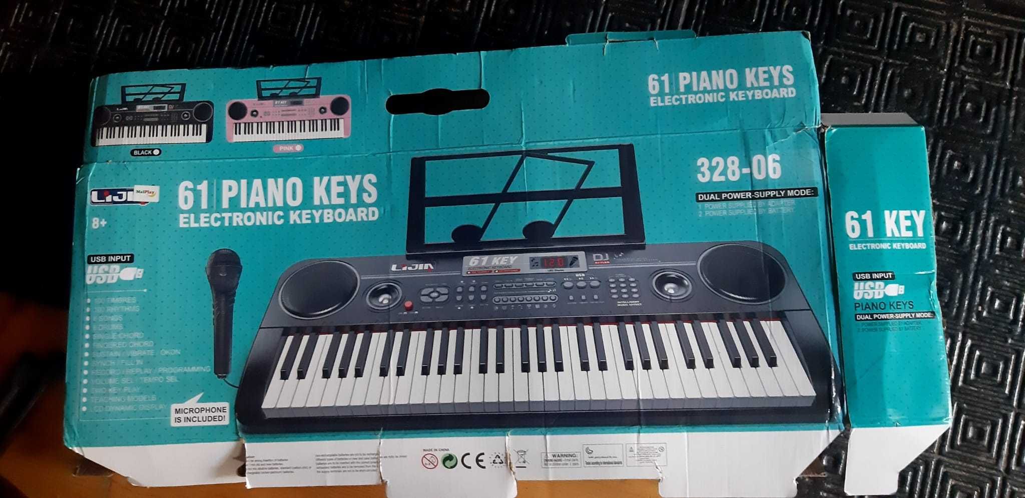 Keyboard razem ze stojakiem 61 Piano Keys, w bardzo dobrym stanie