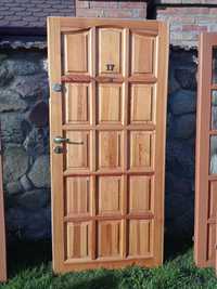 drzwi wejściowe lewe wewnątrzklatkowe drewniane