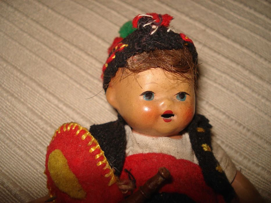 Boneco antigo ,tocador de gaita de foles