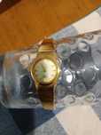 Relógio Vintage em aço dourado marca Seiko