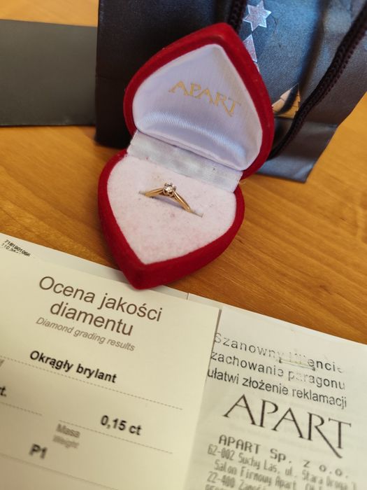 Złoty pierścionek zaręczynowy Apart z brylantem 0,15 ct, złoto 585, ce