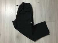NIKE r.L szerokie spodnie baggy sportowe damskie/uniseks stan BDB