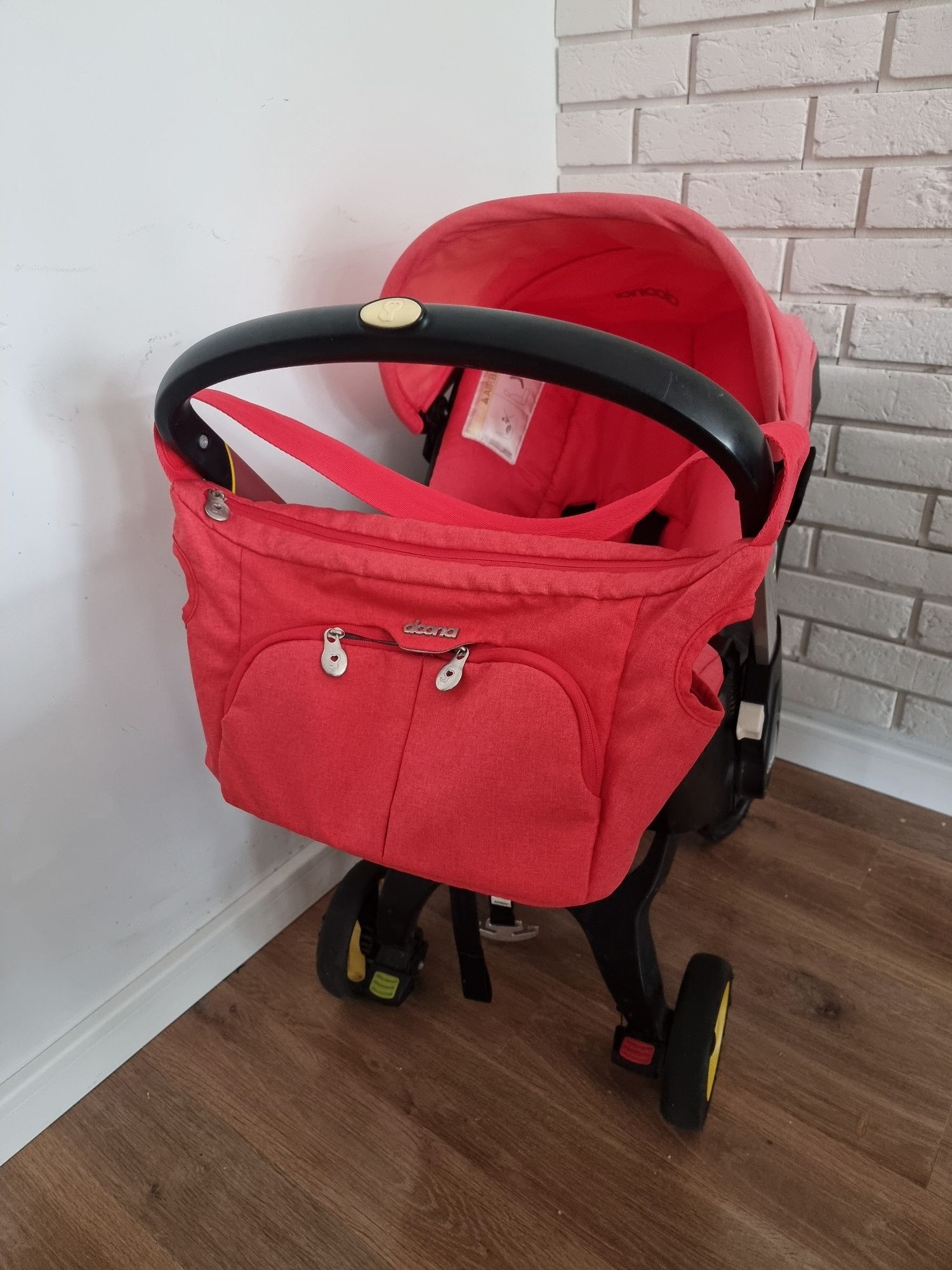 Wózek Doona z bazą isofix + akcesoria