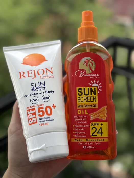 Сонцезахисний крем спф 50 та олійка для засмаги спф 24