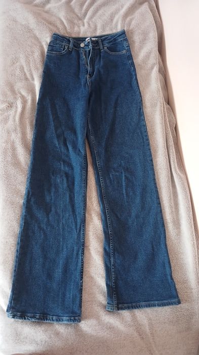 Темно-сині джинси