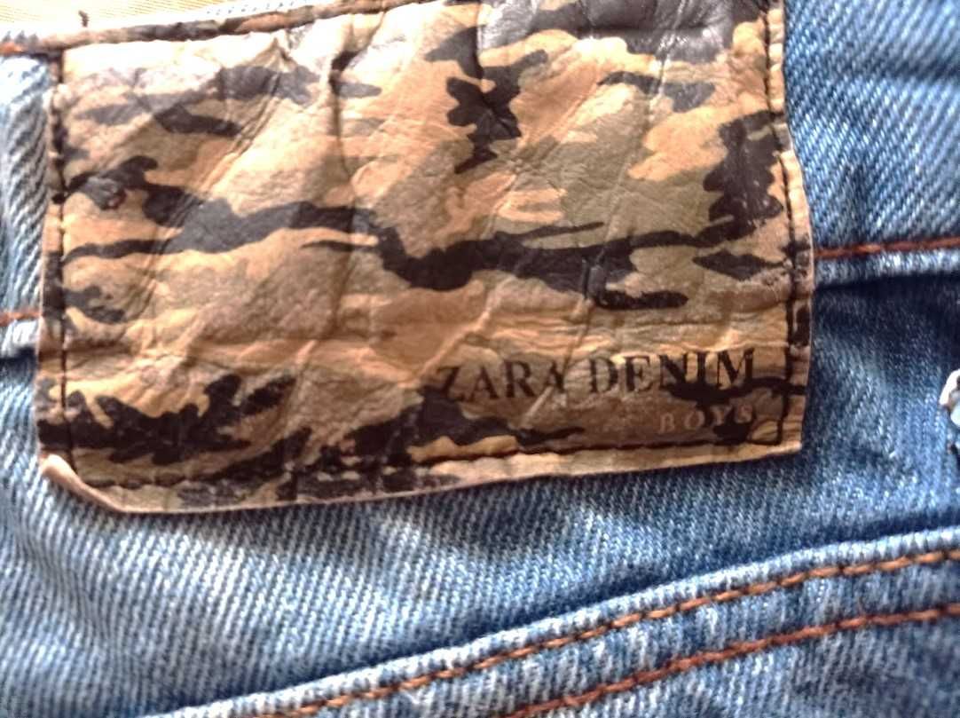 Jeans ganga. efeito deslavado e rasgões para rapaz Tam. 9/10 - Zara