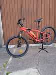 Bicicleta BTT ROCKRIDER ST900 roda 24" vermelha, quadro em alumínio
