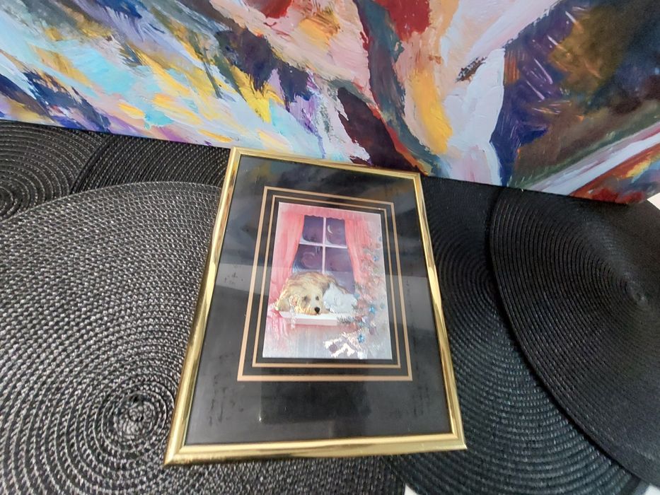 Obrazek w złotej ramce