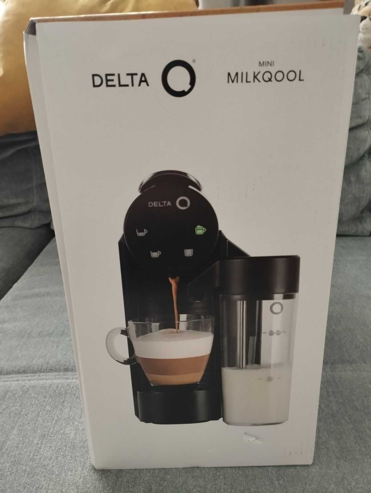 Капсульна кавоварка Nespresso Delta Q з капучинатором