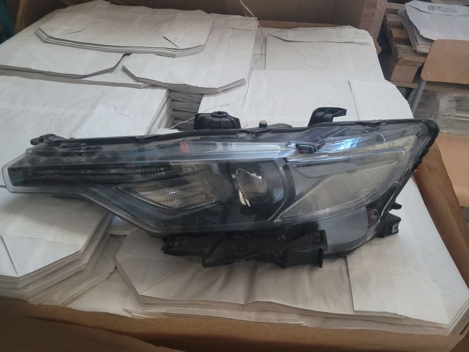 Lampa Maserati lewa przód