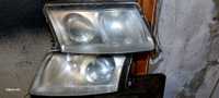 Lampy przednie Passat B5 xenon ori Hella 4 piny komplet.