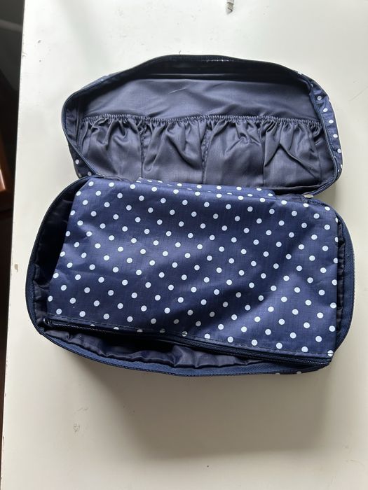 Necessaire + saco de sapatos.