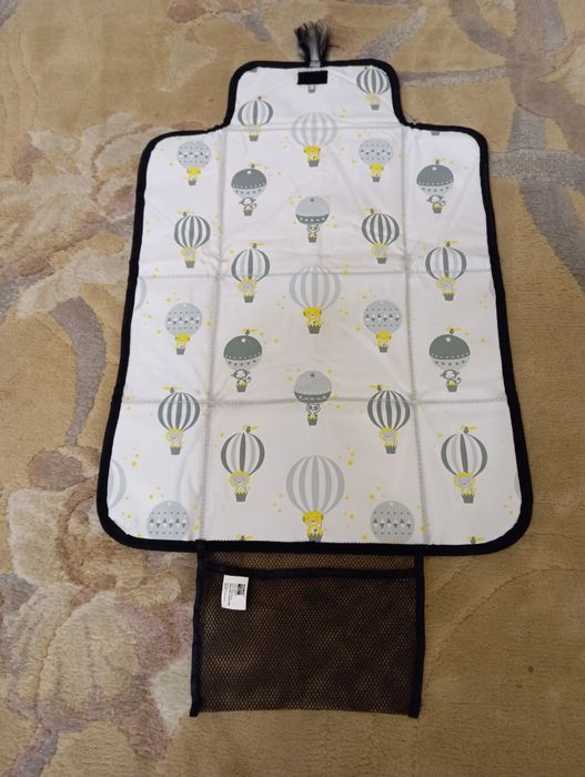 Коврик для пеленания ребенка