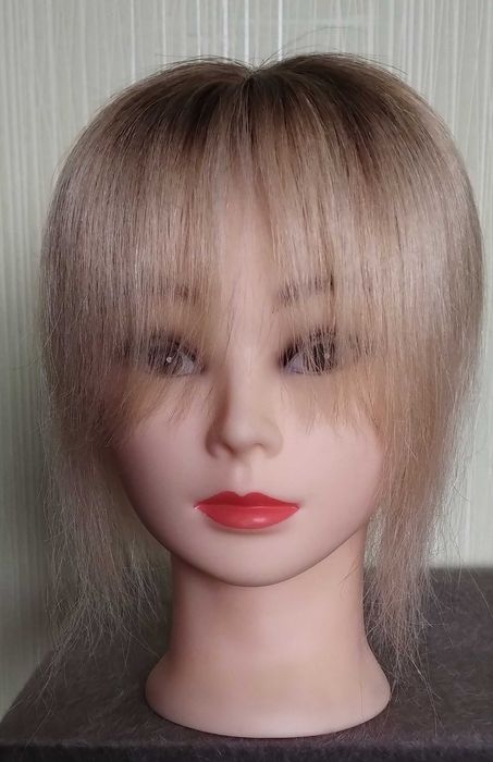 Накладка из натуральных волос.