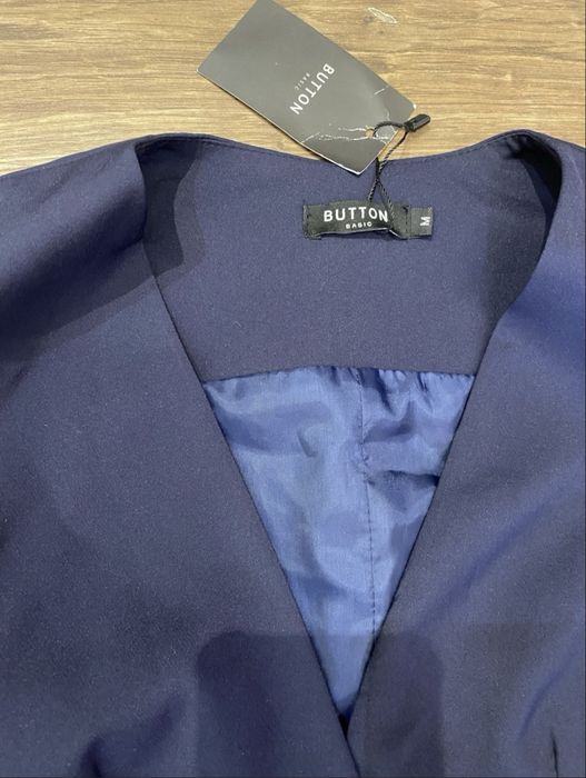 Отдам бесплатно новую синюю жилетку