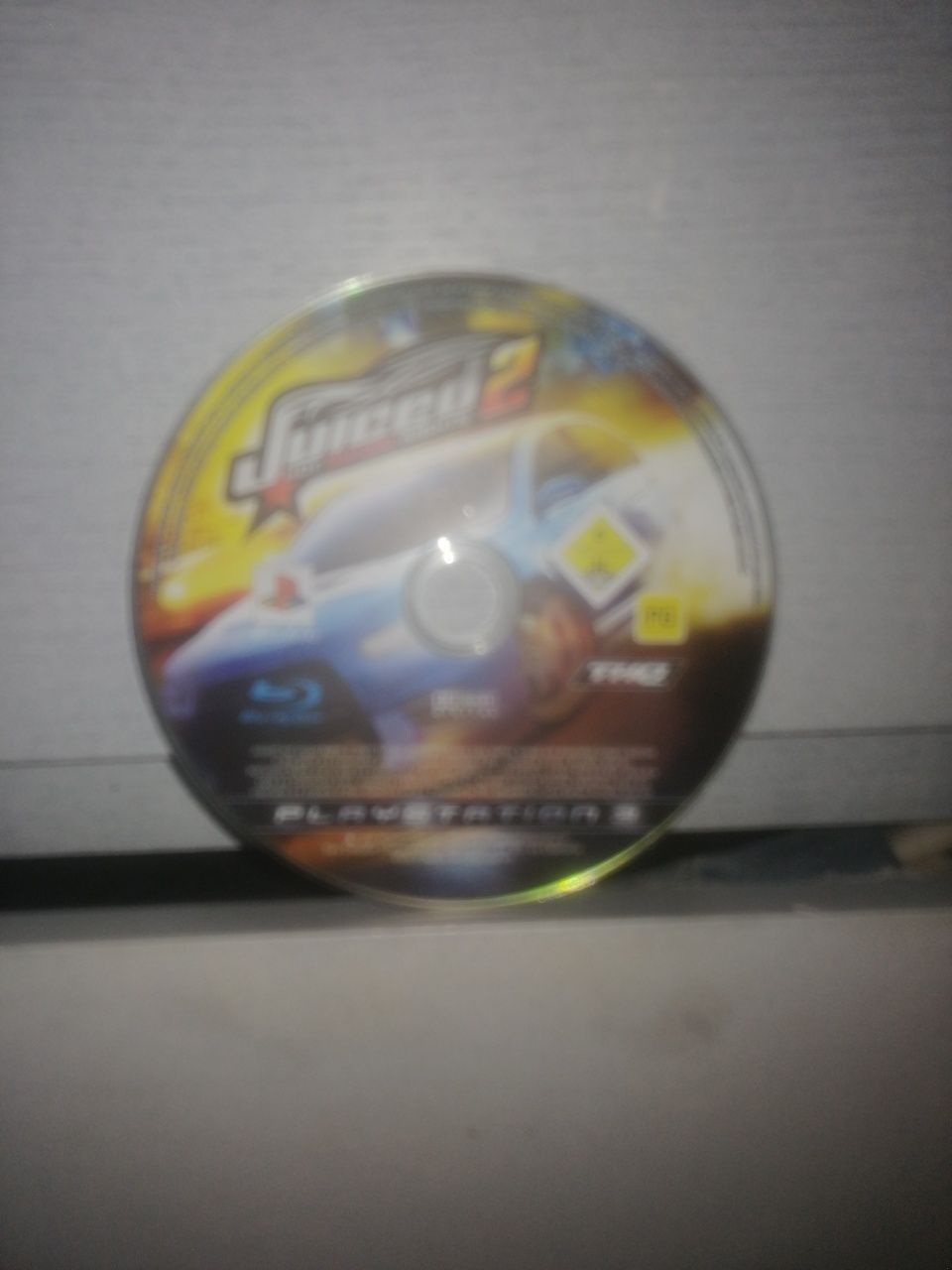 PS3 com volante e pedais