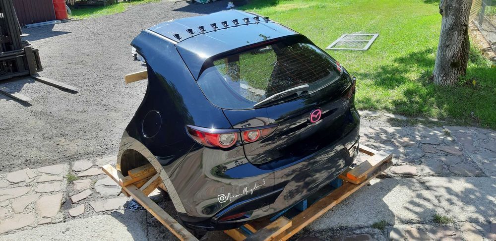 Błotnik klapa tył Mazda 3 19-23r zderzak