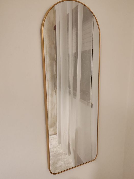 Espelho de parede dourado