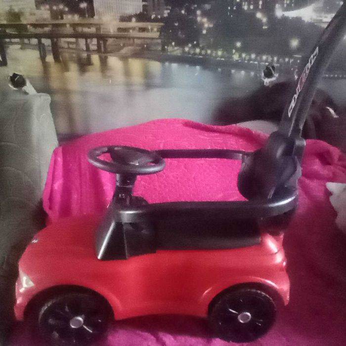 Машина с батьківською ручкою