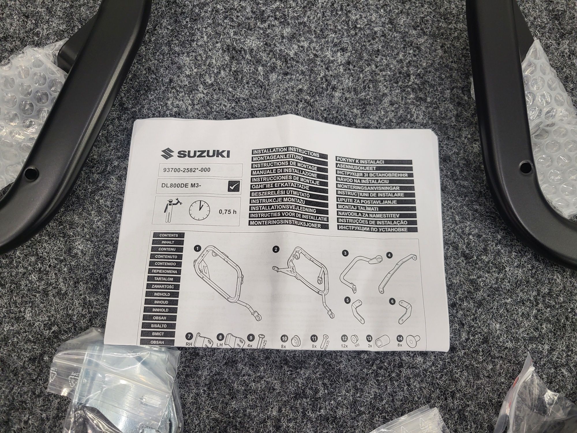 Suzuki DL 800 V-Strom stelaże kufrów bocznych nowe oryginalne