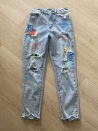 Spodnie jeansy z aplikacjami