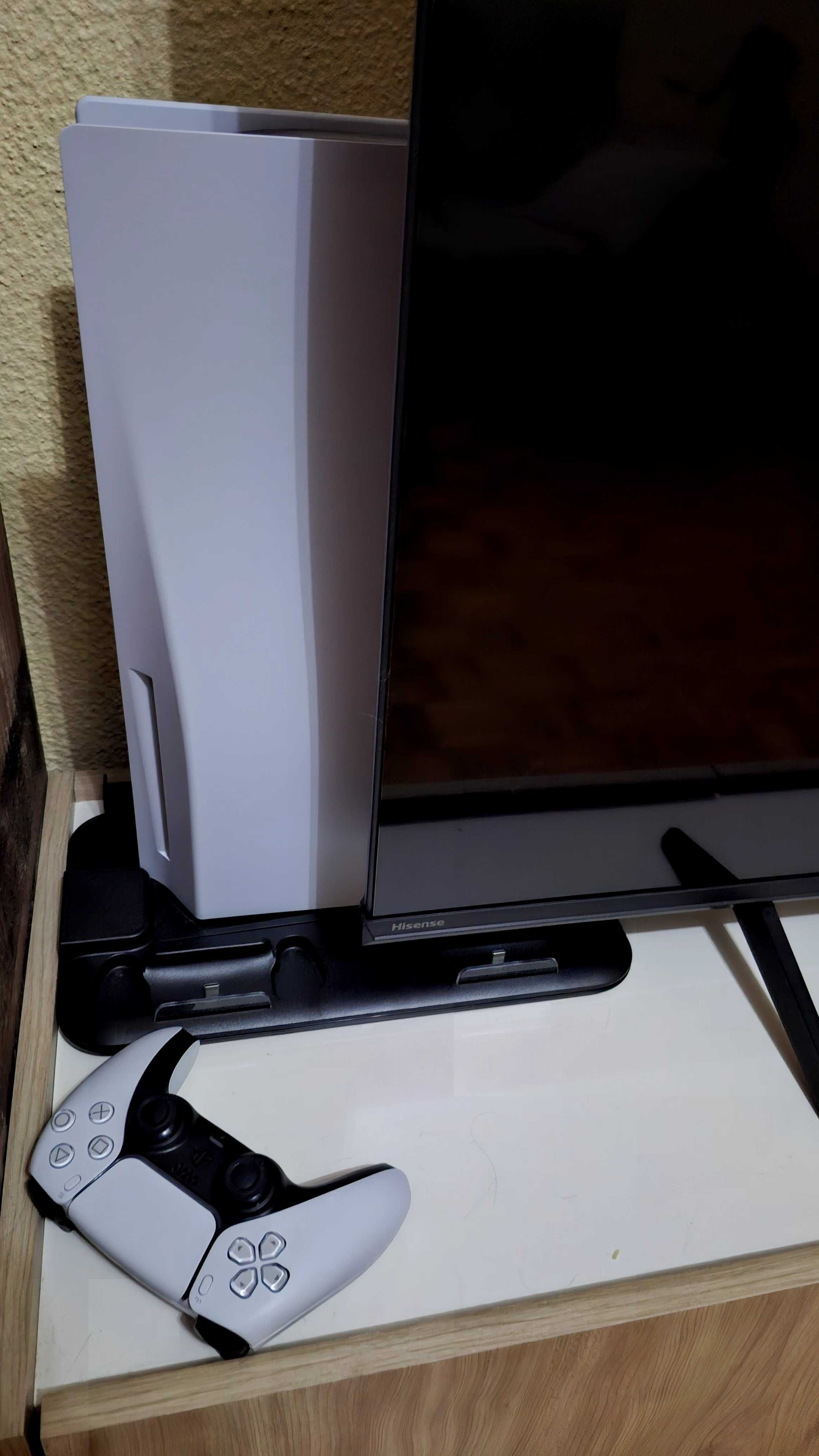 PS5 com comando headphones e resfriador.
