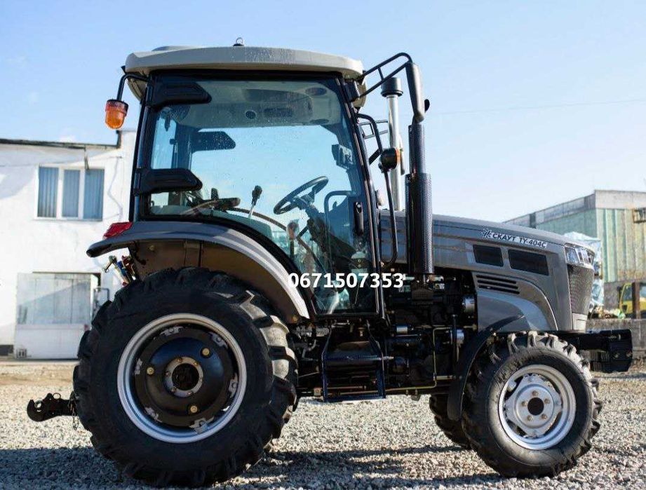 Трактор Скаут 404C з компресором на широких колесах 12.4х24 з реверсом