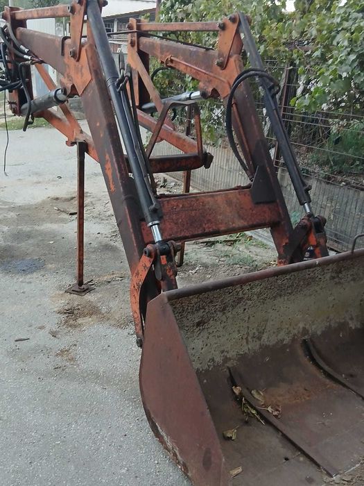 Carregador frontal tenias