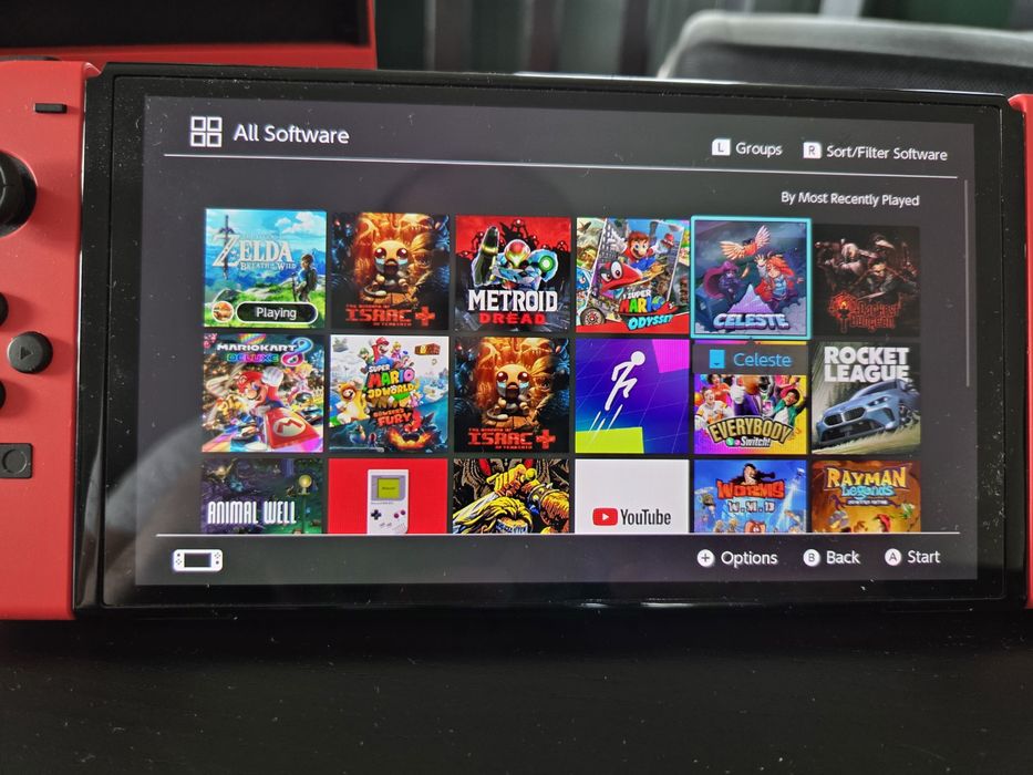 Switch OLED wersja Mario + akcesoria + gry