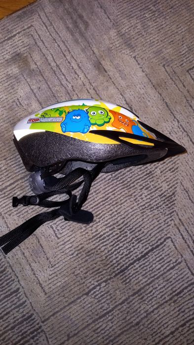 Kask rowerowy dziecięcy w rozmiarze unisize 49-54 cm z lampką z tyłu