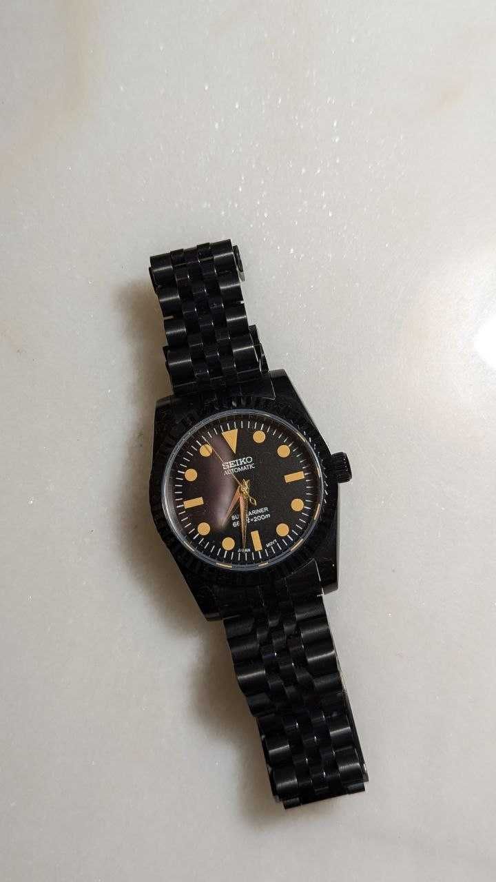 Seiko Preto e dourado