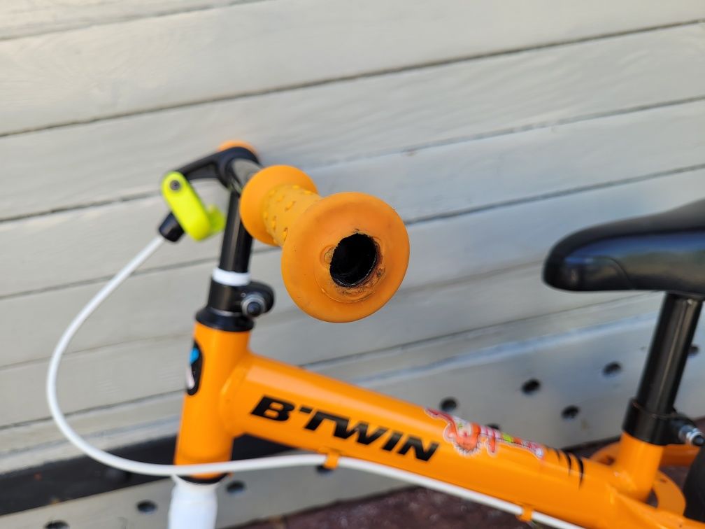 Rowerek biegowy b-twin pomarańczowy