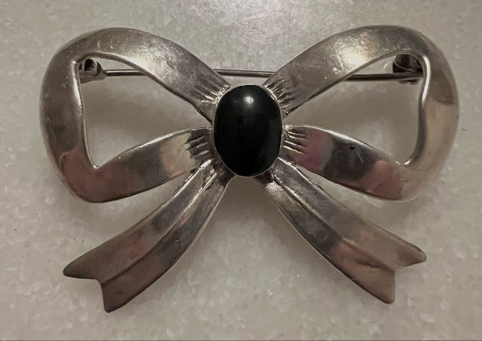 Alfinete de peito em prata