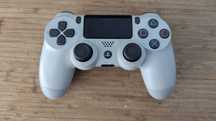 Pad kontroler PS4 Playstation 4 biały - uszkodzony