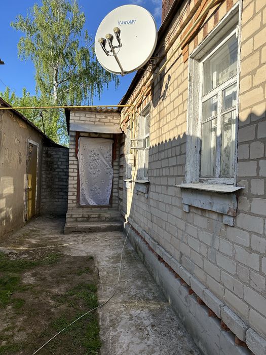 Продам! 1/2 частину  будинку у Подворках