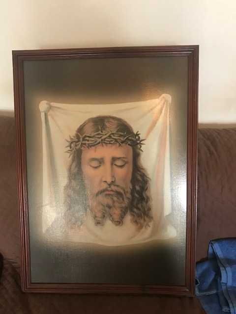 Moldura com rosto de Cristo pintado m estampa plastificada