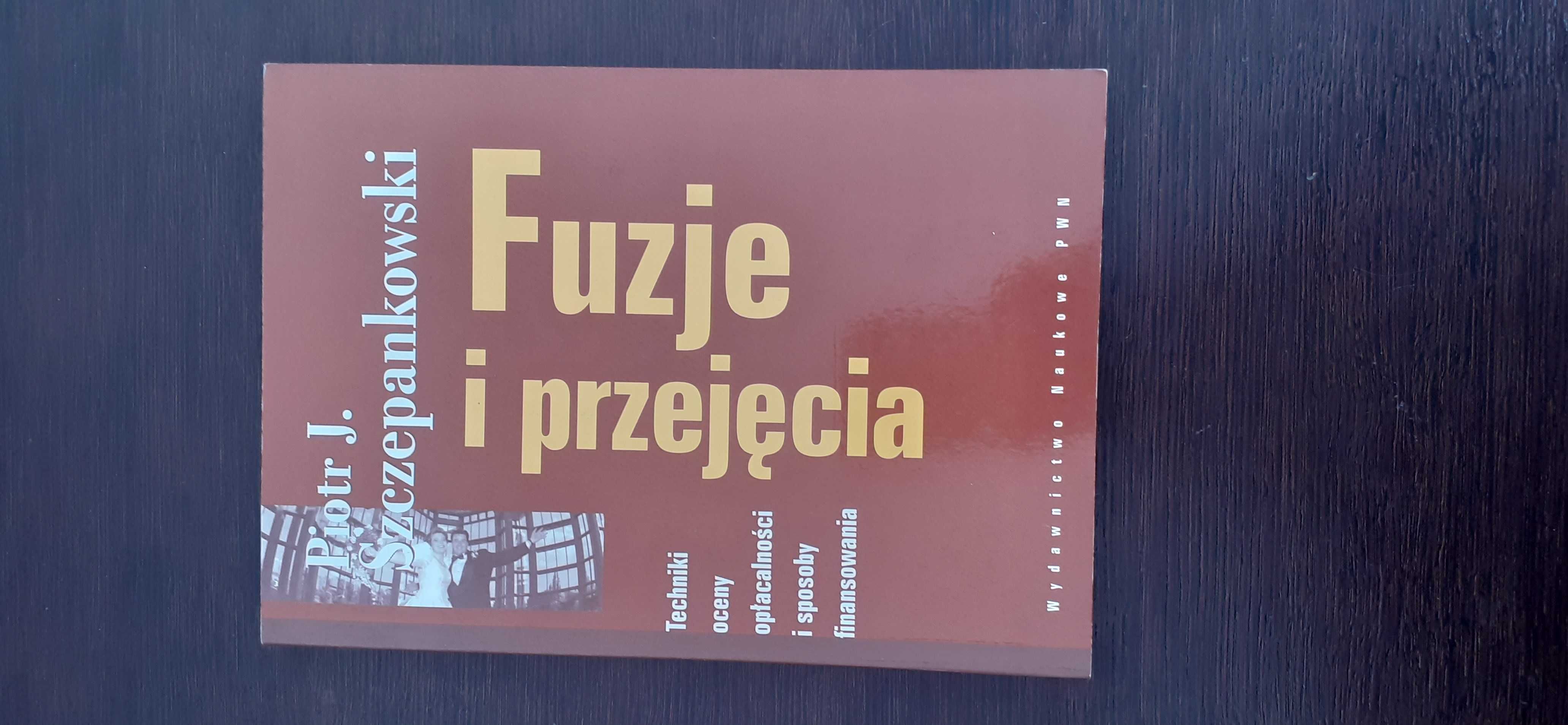 Fuzje i przejęcia - Piotr Szczepankowski