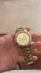 Relogio da one dourado