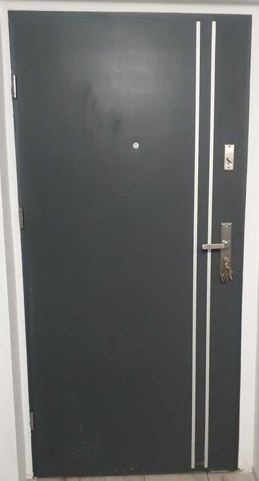 Drzwi z demontażu stalowe na budowę z ościeżnicą 90x200 lewe z zamkiem