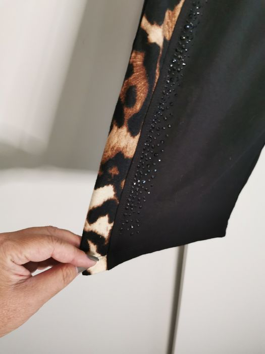 Śliczne czarne spodnie damskie lampas pantera blink blink 42/44 wiskoz