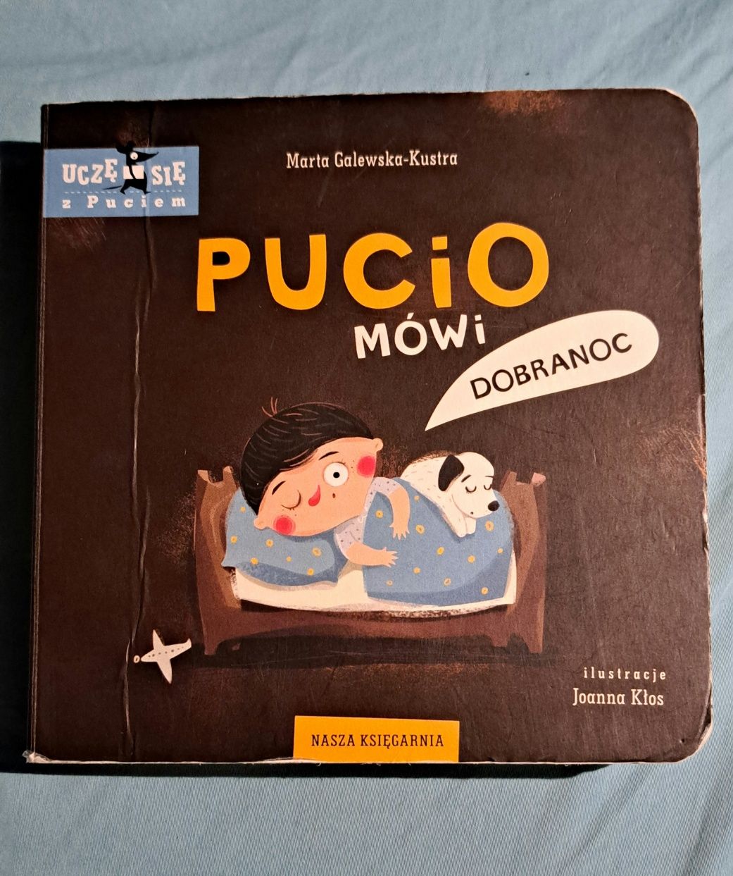 Tablica manipulacyjna plus Pucio mówi dobranoc