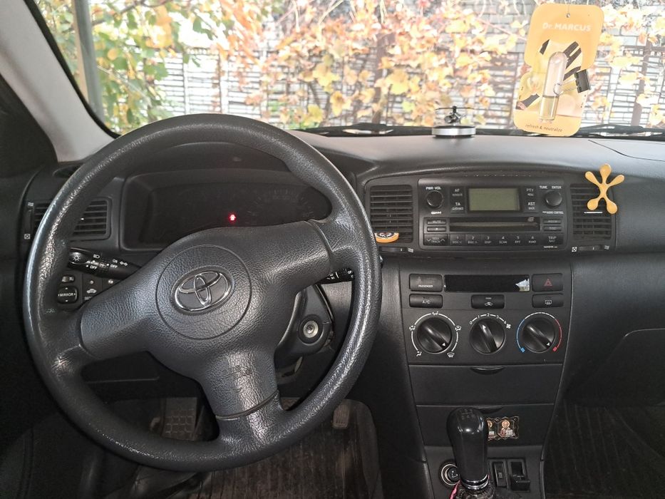 Тойота корола е120