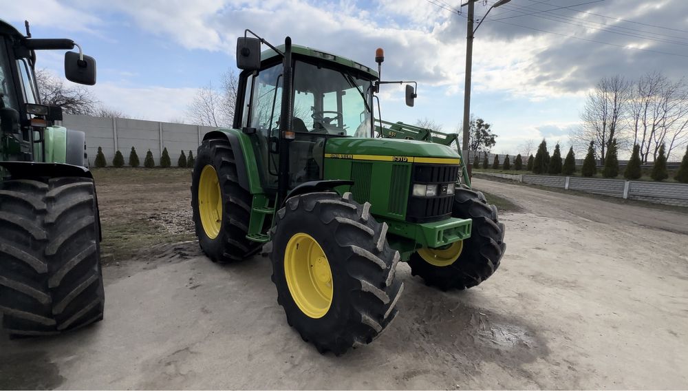 Трактор John Deere 6310