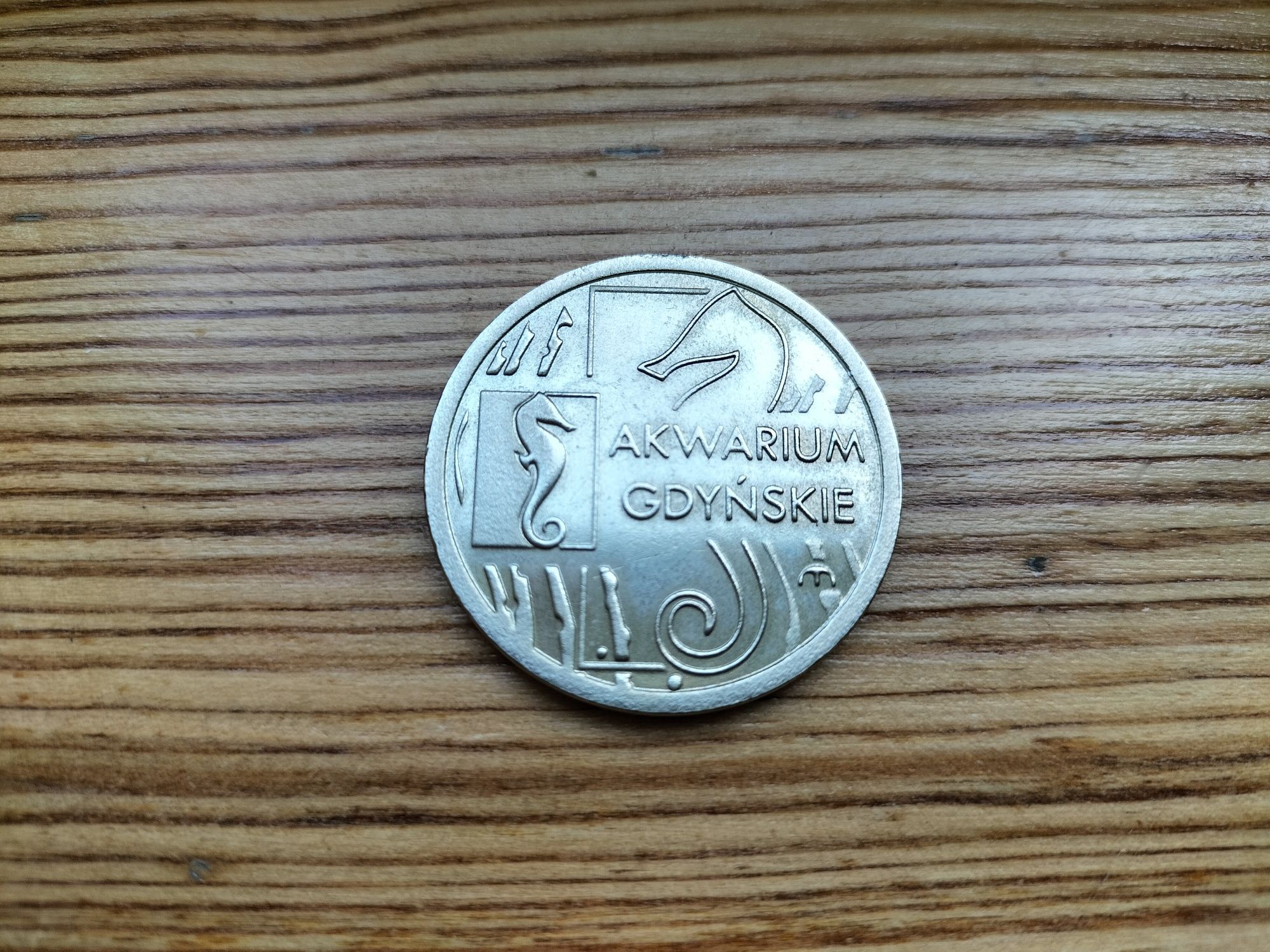 Moneta pamiątkowa 6 muszelek - Najeżka, Akwarium Gdyńskie