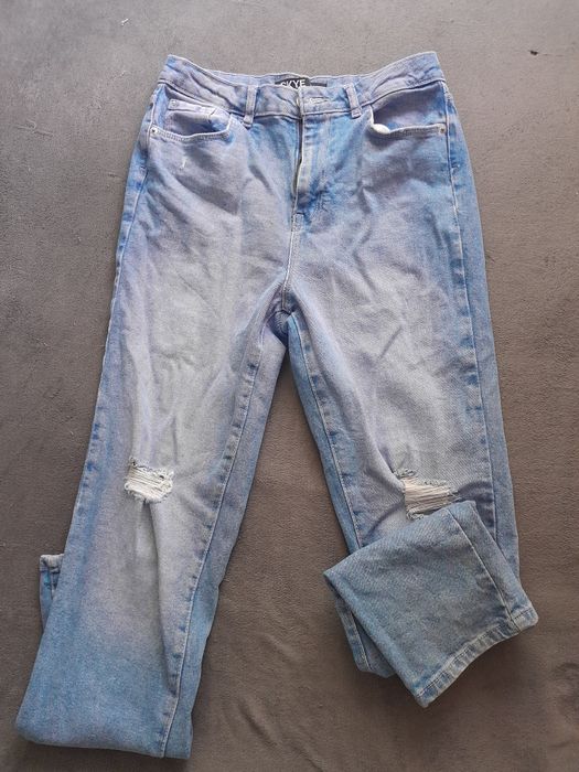Джинси  з потертостями
