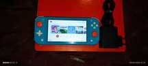 Vendo Nintendo Switch Lite azul bebé + bolsa de transporte.